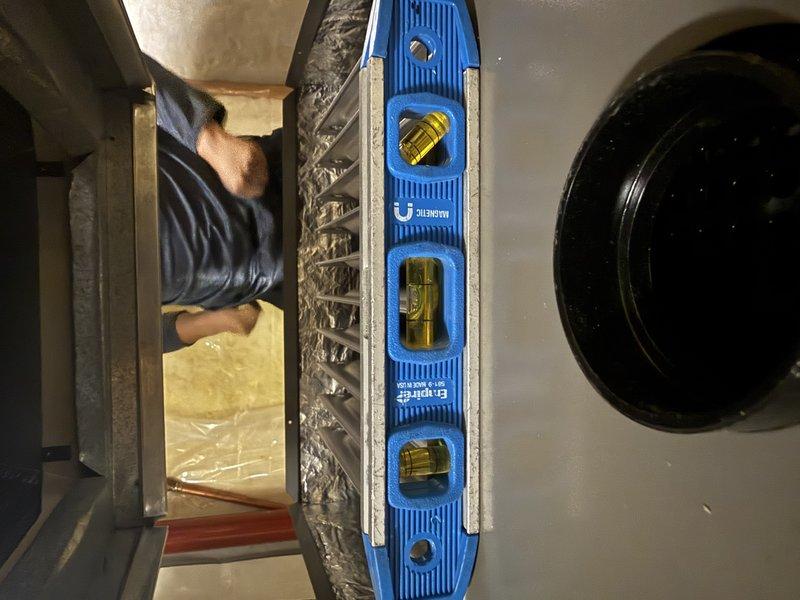 Completed full HVAC system upgrade including installation of EL297V 110,000 BTU furnace and 50-gallon natural gas atmospheric Bradford White water heater. Replaced existing 16x25x5 filter with 20x25 filter in new media cabinet. Repositioned furnace orientation for improved serviceability and replaced leaking 3" PVC venting components. All equipment leveled, tested, and verified operational prior to completion.