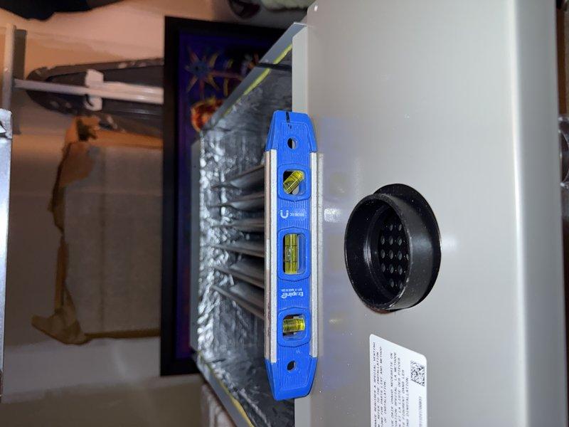 Completed full HVAC system installation for 1,570 square foot first floor application. Installed SLP99 70K BTU furnace with S40 thermostat as primary heating system. Removed first 4 feet of existing 2-inch cellular core ductwork off furnace discharge and replaced with proper 2.5-inch solid core material to match remaining 10 feet of trunk line. Replaced existing 8x22 return air drop and relocated closer to furnace for improved efficiency. Installed new media cabinet for filtration system. Completed all PVC condensate drain connections utilizing existing drain location near furnace. Verified existing air conditioning system compatibility and integration with new furnace. Installed 15-amp dedicated electrical circuit utilizing existing Square D QO panel with conduit run to ceiling and Romex connection to furnace, eliminating need for licensed electrician. Patched wall opening from return relocation. Tested all system operations including heating cycle, thermostat functionality, airflow d