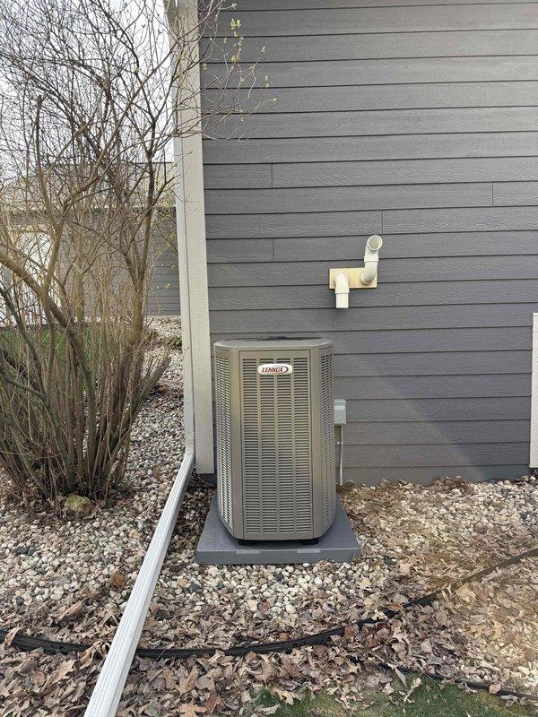 Completed full HVAC system replacement including installation of SLP99 90,000 BTU furnace, EL18KVC 3-ton air conditioner, 36B evaporator coil, and S40 thermostat. Replaced 35 feet of 3-inch cellular core ductwork and return drop to optimize airflow distribution. Installed new media cabinet for enhanced air filtration. Replaced 35 feet of refrigeration lines connecting outdoor condenser unit to indoor coil for proper refrigerant flow. Verified existing drain line and gas valve were in acceptable working condition and retained for continued use. Cleaned all intake vents for makeup air system and heat recovery ventilator (HRV) to ensure proper fresh air exchange. Washed and reinstalled HRV filters to maintain indoor air quality. Connected furnace to dedicated 15-amp circuit breaker and air conditioning unit to dedicated 35-amp circuit breaker on Square D QO electrical panel, ensuring proper electrical protection and code compliance. All equipment installed level and secured according to m