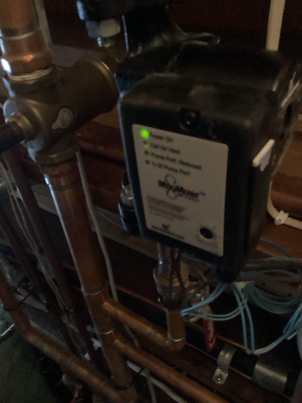 Replaced a noisy draft inducer motor assembly on the boiler system and performed a complete tune-up to restore proper operation. The existing venter inducer was producing excessive noise and the boiler interior had accumulated debris affecting efficiency. Installed new inducer assembly, cleaned all components during tune-up, and established proper electrical connection between the air conditioning system and boiler for integrated operation.