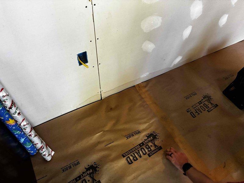 Responded to emergency call for water leaking from ceiling. Upon inspection, identified compromised PVC condensate drain line causing active water intrusion. Assessed installation to determine if issue stemmed from recent installation work versus existing equipment failure. Documented findings with photographs showing ceiling damage, drywall water staining, and affected areas for further evaluation and proper billing determination.