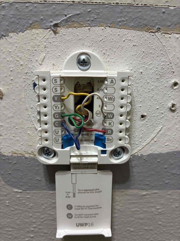 Completed comprehensive air conditioning tune-up and resolved thermostat wiring issue that was preventing system operation. Corrected improper wire connections at thermostat terminals, restoring full functionality to the outdoor condenser unit. System tested and confirmed operational following repairs.