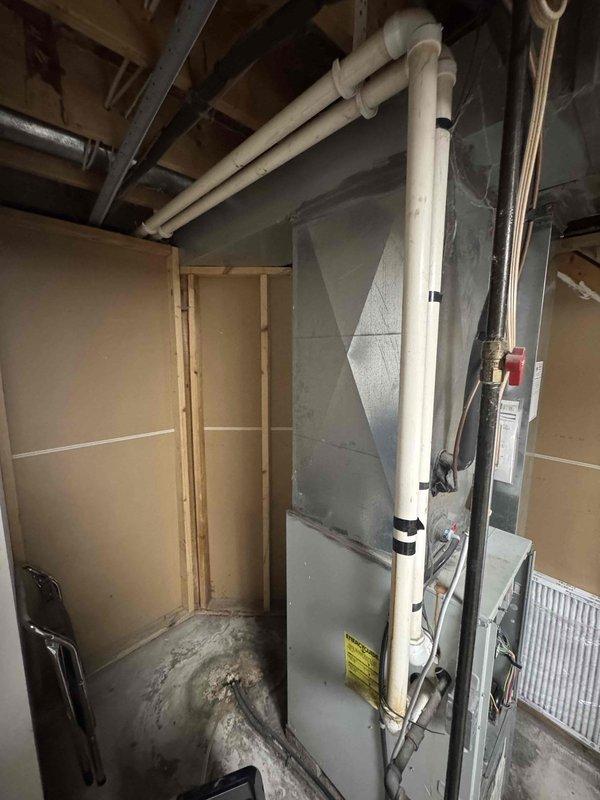 Performed complete furnace tune-up on 1999 unit including inspection of heat exchanger, flame sensor, igniter, inducer motor, blower motor, burners, venting, safety limit, and gas operation. Cleaned blower compartment, drain trap, and drains. Recorded operational readings: inducer motor 2.7A, gas pressure 1.7/3.4inWC, blower motor 11.1A, HSI 52.4 ohms, heat rise 40°F. Testing revealed heat exchanger failure with carbon monoxide levels at 195ppm, exceeding safe operational limits. Blower motor also showing signs of failure. Due to age of equipment and critical safety concerns with heat exchanger, system replacement is strongly recommended. Customer advised to replace 16x25x1 filter and contact office for free replacement quote.