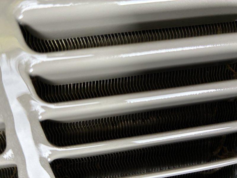 Completed annual prepaid air conditioning maintenance visit. Replaced air filter and documented filter size specifications for future service reference. Inspected evaporator coil assembly, noting condensation present on fins and tubes indicating proper operation. Cleaned outdoor condenser coil which showed accumulated dirt and debris buildup. Performed thorough system cleaning and inspection per CCC Quality Plan requirements.