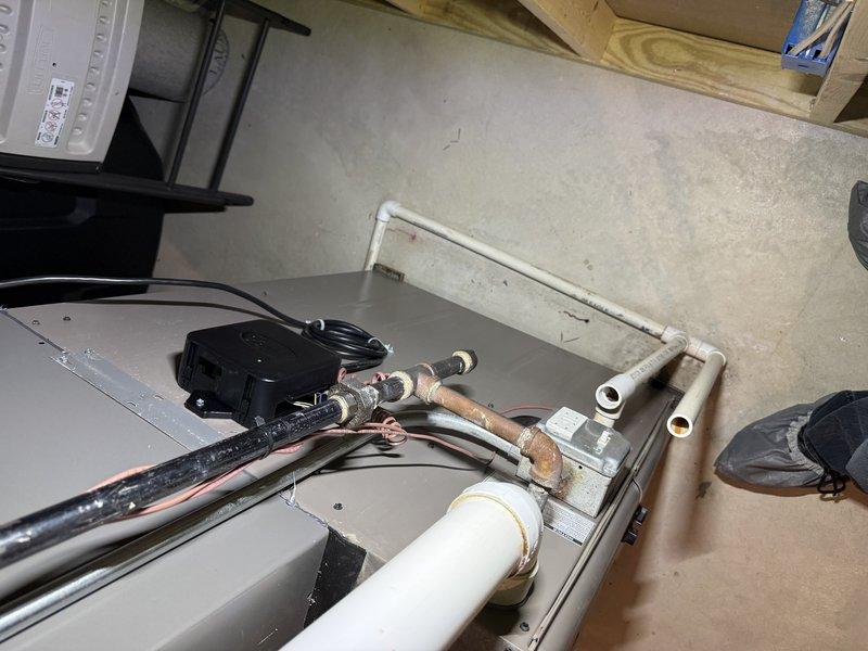 Successfully completed installation of a 3-ton EL15KC1 air conditioning unit with a 36B-71 cased evaporator coil. The installation included mounting the new outdoor condensing unit, installing the indoor cased coil, establishing refrigerant line connections with proper brazing techniques, and integrating the electronic control system with appropriate wiring and safety devices. All copper refrigerant lines were properly insulated and secured, electrical connections were completed to manufacturer specifications, and the system was tested for proper operation upon startup.