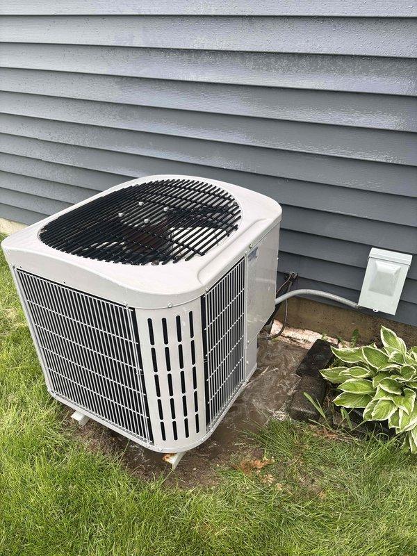 Completed comprehensive air conditioning tune-up on outdoor condenser unit and indoor Carrier furnace system. System was found to be low on refrigerant, indicating a potential leak that will require monitoring or repair. Based on the age and condition of the equipment, along with the refrigerant deficiency and rust concerns previously noted by another contractor, recommended replacement of the unit for optimal performance and efficiency.