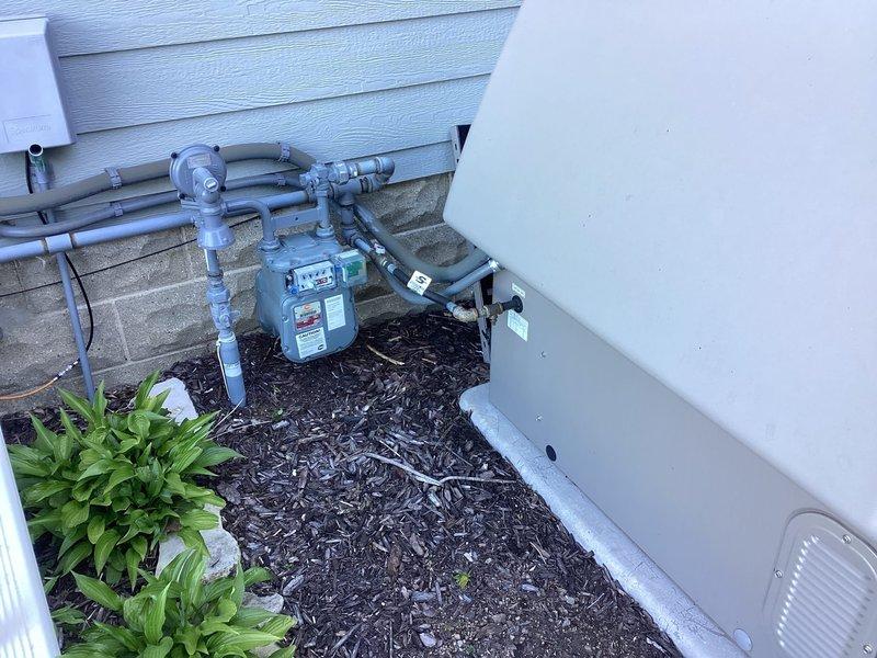 Completed preventative maintenance on 2022 Kohler standby generator at residential property. Unit had been running on weekly test cycles and successfully operated for 48 hours during a recent power outage. Performed comprehensive PM inspection including engine oil and filter service, air filter inspection, spark plug evaluation, battery load test, coolant level check, and fuel system inspection. Verified proper operation of natural gas supply system and connections. Tested automatic transfer switch functionality and confirmed proper voltage output under load. Inspected all electrical connections, control panel operation, and safety systems. Unit passed all operational tests and is functioning within manufacturer specifications. Generator and transfer switch are ready for automatic operation during future power outages.