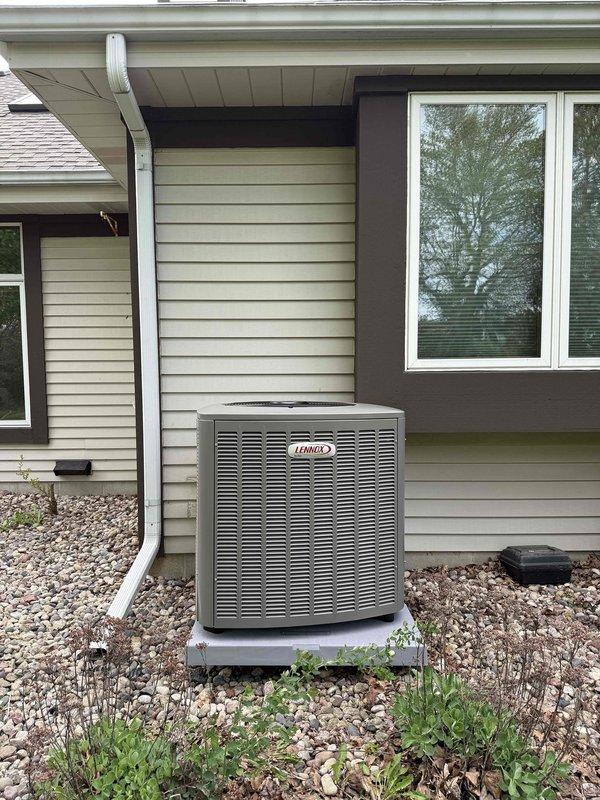 Completed full installation of Lennox EL15KC1 3-ton air conditioning unit and 36B-71 coil system for 2050 square foot residential property. Replaced 35-foot line set and installed "B" width cased coil compatible with existing Lennox furnace. Installed new concrete pad while retaining existing mounting brackets, verified proper drainage, and confirmed electrical connections to Square D Homeline panel with 15-amp furnace circuit and 30-amp AC circuit. System tested and operational upon completion.