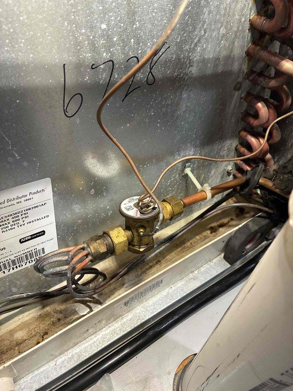 Responded to no cooling complaint on R410A system. Upon inspection, diagnosed low refrigerant charge as cause of insufficient cooling. Performed leak check and added refrigerant to system to restore proper charge levels. System tested and confirmed operational after refrigerant addition.
