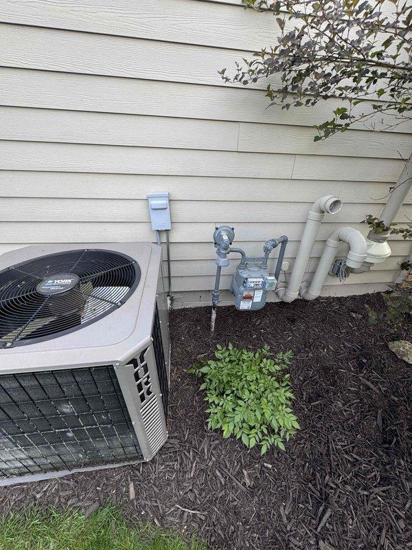 Completed prepaid maintenance visit on a 2002 York R-22 air conditioning system. Performed comprehensive AC tune-up including system inspection, temperature differential testing, and electrical measurements. Installed new 14x25x1 filter from homeowner's stock. Measured compressor amperage at 1.9A and condenser fan at 1A. Capacitor tested at 43.7/4.2 μF against rated 45/5 μF specification.

Testing revealed significantly low refrigerant levels resulting in inadequate cooling performance, with only 2°F temperature drop across the evaporator coil (return temp 67°F, supply temp 69°F). Due to the age of the equipment (21 years old), obsolete R-22 refrigerant, critically low refrigerant charge, and cost considerations for R-22 recharge, recommended complete system replacement rather than repair.