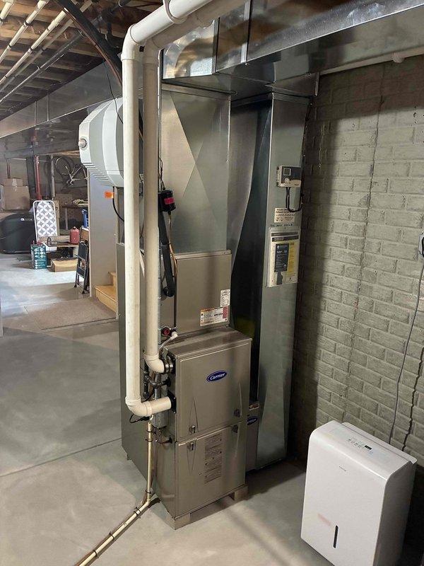 Responded to no cooling complaint on Carrier split system. Upon inspection, diagnosed low refrigerant charge as cause of insufficient cooling performance. Added refrigerant to bring system to proper operating levels and restore cooling functionality.
