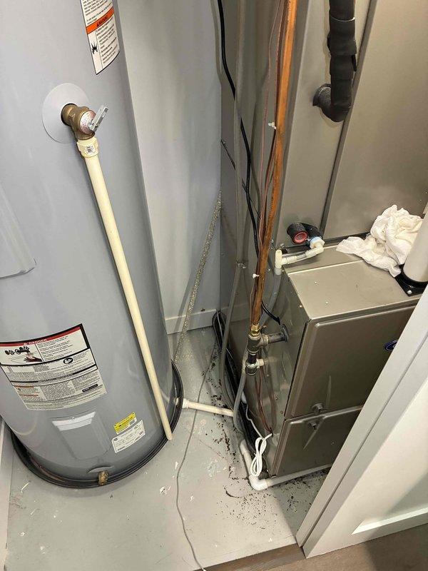Responded to after-hours emergency call for no power to rooftop AC unit with water present on ground. Upon arrival, inspected thermostat wiring and confirmed proper connections at R, C, Y1, G, and W1 terminals. Traced power issue to rooftop unit and identified water intrusion as source of electrical failure. Assessed indoor air handler and surrounding mechanical equipment for water damage. Restored power to system after addressing water intrusion issue and verifying all electrical connections were secure and dry.