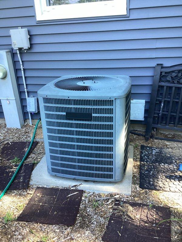 Completed annual prepaid AC maintenance and inspection under CCC Quality Plan. Performed comprehensive clean and check of air conditioning system including indoor furnace/air handler unit and outdoor condenser unit. Inspected ENERGI brand furnace cabinet, verified all manufacturer labels and safety specifications present and legible. Checked air handler, filtration system, PVC condensate drainage lines, and all associated connections at indoor unit. Proceeded to outdoor condenser unit, inspected beige cabinet housing, louvered panels, fan assembly, and electrical connections including service disconnect panel. Verified proper clearances around outdoor unit and concrete pad condition. All system components operating within normal parameters with no deficiencies noted. System shows good overall condition with no repairs required at this time.