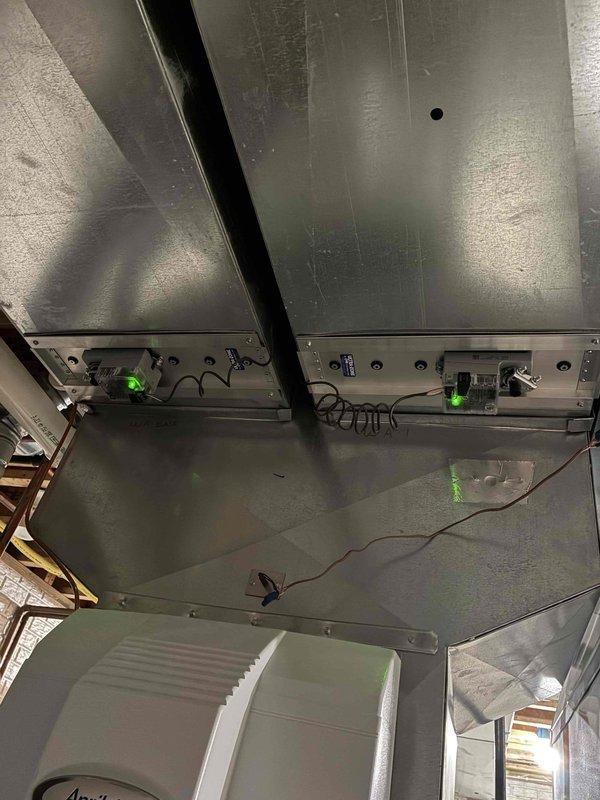 Completed annual prepaid maintenance visit on dual-zone HVAC system. Performed comprehensive inspection of air handling units, verified operational status of control boards with all indicator lights functioning properly, examined ductwork assembly and electrical connections, and confirmed proper labeling and routing of refrigerant lines serving first and second floor zones. Replaced air filter per maintenance agreement terms and documented system condition with photos.