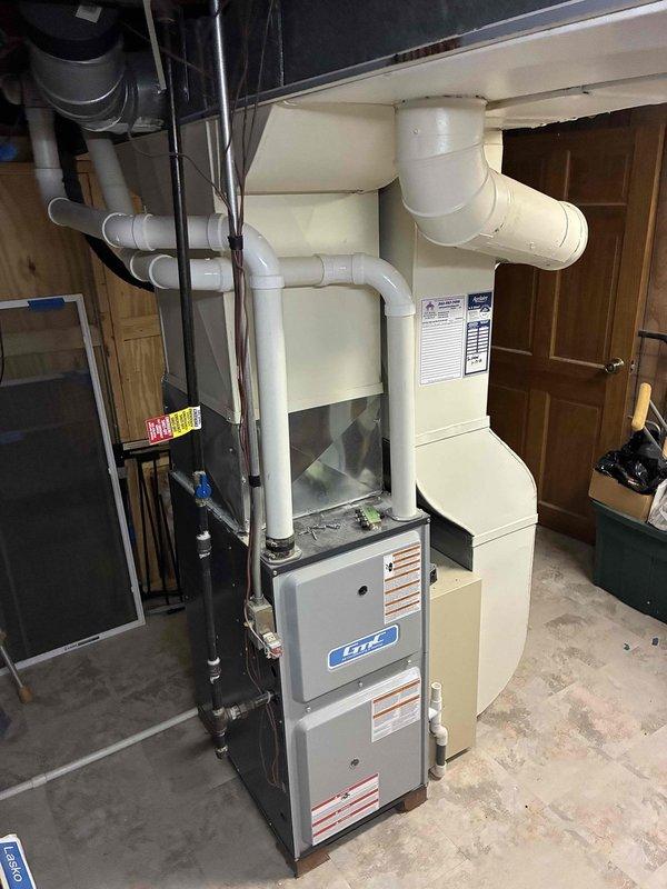 Responded to no cooling complaint on main level of residence with 10+ year old HVAC system. Upon inspection, found dirty air filter restricting airflow through the air handler unit, which was causing reduced cooling capacity and potential system shutdown on safety limits. Replaced filter and verified proper airflow restoration. Inspected furnace, ductwork, and refrigerant lines for any additional issues. System returned to normal operation with adequate cooling to affected areas. Recommended scheduling preventive maintenance to ensure continued reliable operation.