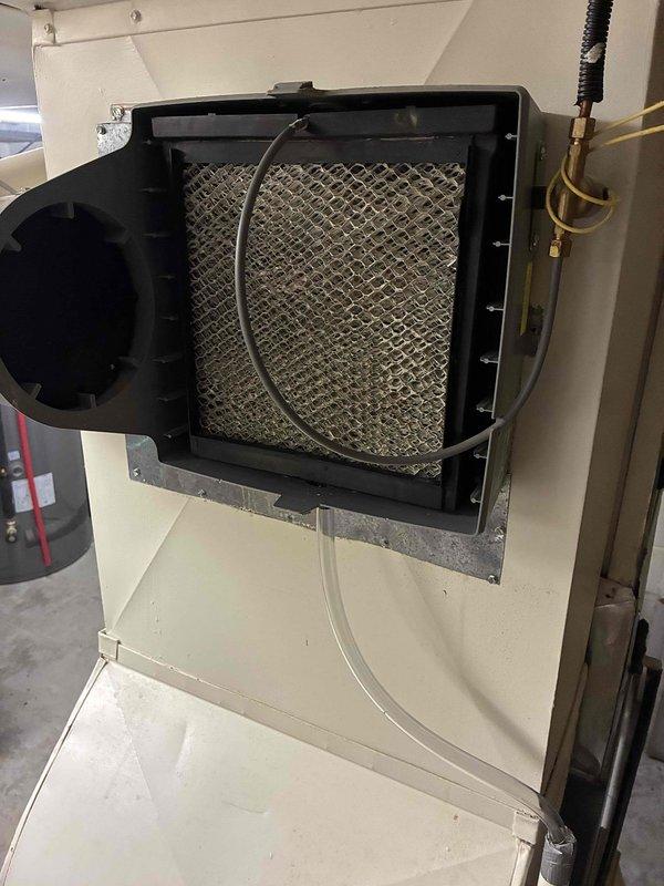Responded to no cooling complaint on main level of residence with 10+ year old HVAC system. Upon inspection, found dirty air filter restricting airflow through the air handler unit, which was causing reduced cooling capacity and potential system shutdown on safety limits. Replaced filter and verified proper airflow restoration. Inspected furnace, ductwork, and refrigerant lines for any additional issues. System returned to normal operation with adequate cooling to affected areas. Recommended scheduling preventive maintenance to ensure continued reliable operation.