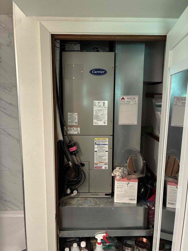 Responded to service call for excessively loud compressor operation on Carrier split system air conditioning unit. Upon arrival, inspected outdoor condenser unit and indoor air handler, documenting equipment condition with photographs. Unit had been shut down by customer due to noise concern. Performed visual inspection of compressor, fan motor, and mechanical components to assess source of abnormal sound and determine necessary repairs or recommendations for system operation.