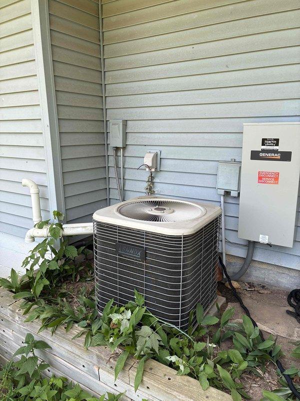Responded to service call for residential air conditioning unit experiencing repeated freeze-up cycles. Upon arrival, inspected outdoor condenser unit and indoor air handler system. Found vegetation growth around outdoor unit restricting airflow to condenser coils. Cleared debris and vegetation from around equipment perimeter to restore proper air circulation. Evaluated system operation and airflow at indoor furnace/air handler. Assessed cooling capacity concerns and documented equipment specifications for potential sizing evaluation. System cycled properly after clearing obstructions. Advised customer on importance of maintaining clearance around outdoor unit and recommended monitoring system performance over next several cooling cycles.