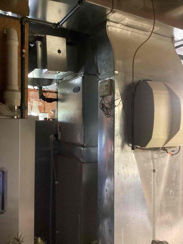 Completed annual maintenance on 19-year-old Carrier air conditioning system under CCC Quality Plan agreement. System found low on refrigerant for second consecutive year despite previous addition of 4 lbs of refrigerant and leak sealant, indicating persistent leak in system. Performed comprehensive maintenance including washing debris from outdoor condensing unit coil to restore proper airflow and heat transfer efficiency. Provided customer with quote for new AC system replacement due to age of equipment and ongoing refrigerant loss issue.