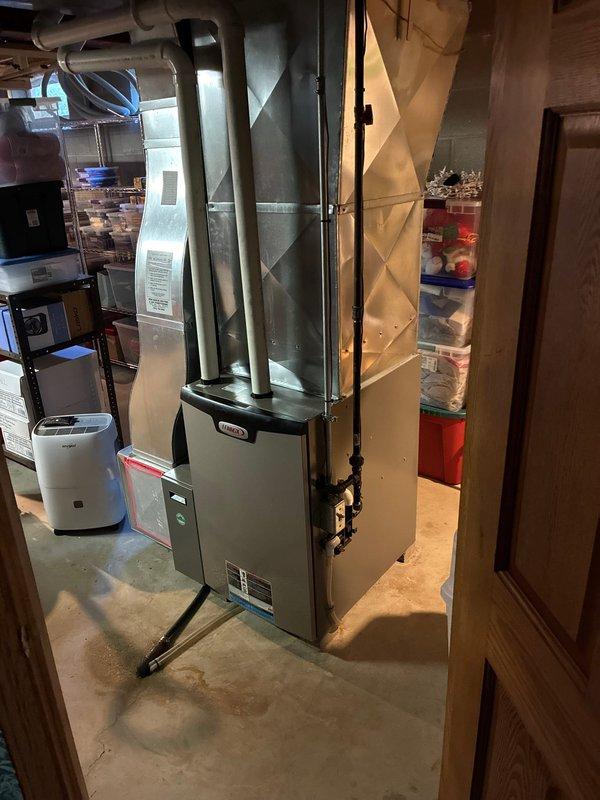 Responded to no cooling complaint on Lennox system where previous contractor had recently replaced control board and quoted blower motor replacement. Upon inspection, verified blower motor failure and examined newly installed control board for proper operation. Documented existing equipment condition including furnace installation, ductwork configuration, and control board components showing ECM drive connections and relay positions. Consulted with manufacturer technical support regarding warranty coverage options for blower motor replacement versus complete system replacement due to age and repair costs, providing customer with comprehensive assessment of repair versus replacement options for informed decision-making.