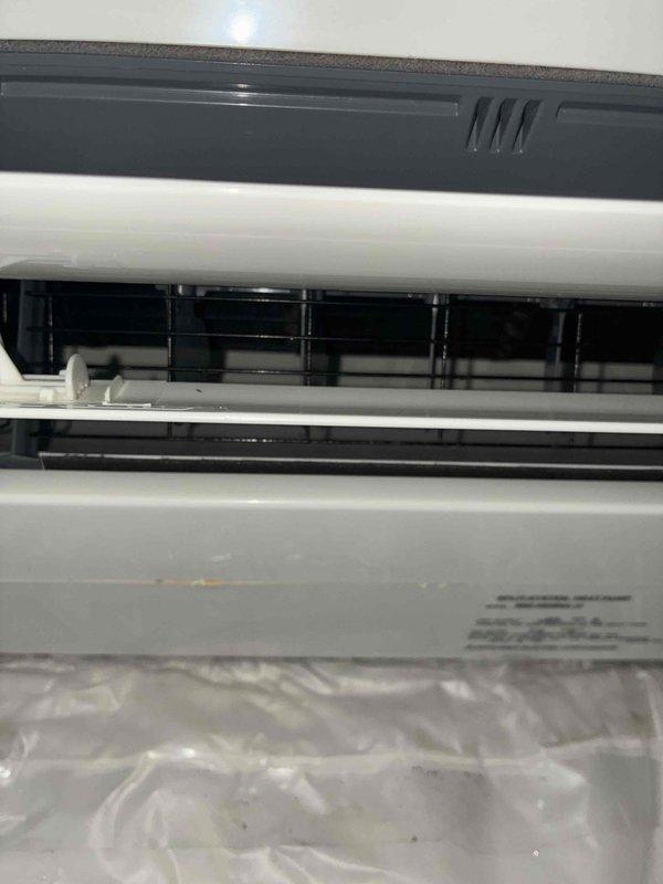 Performed deep cleaning service on ductless mini-split indoor air handler unit that was discharging black debris onto furniture. Disassembled front cover and louver assembly to access evaporator coil, blower wheel, and internal components. Removed accumulated dirt, dust, and microbial growth from blower assembly, coil fins, and air distribution louvers using specialized cleaning solutions and equipment. Sanitized all internal surfaces, reassembled unit, and verified proper airflow and operation upon completion.