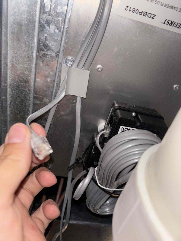Responded to callback regarding damper issue on second level zone not opening properly. Inspected ZoneFirst MasterZone zoning system control panel and verified proper operation with green LED indicators illuminated. Checked damper wiring connections and communication cables to ensure secure connections throughout the system. Performed routine maintenance inspection on AC unit and verified all zones functioning correctly. System operating as designed with no issues found upon completion of service call.