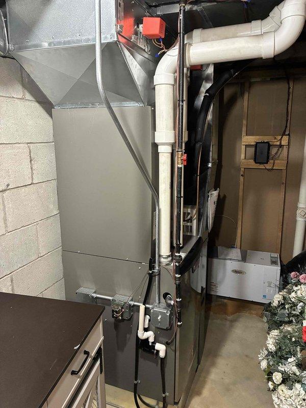 Responded to no cooling complaint on residential HVAC system. Upon arrival, inspected both indoor air handler unit located in basement mechanical room and outdoor condensing unit. System evaluation revealed lack of cooling performance. Performed diagnostic testing on electrical components, refrigerant system, and mechanical operation of both indoor and outdoor units to identify root cause of cooling failure and restore proper system function.