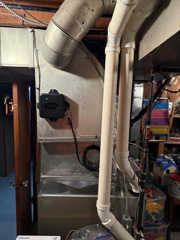 Completed installation of new air conditioning system and evaporator coil to replace existing failed equipment. Removed old AC unit and coil, installed new Carrier HVAC system with matching evaporator coil in basement utility area, connected all necessary ductwork including plenum sections and flexible ducts, verified proper refrigerant charge and airflow, tested system operation for cooling functionality, and confirmed all safety labels and manufacturer specifications were properly displayed on equipment.