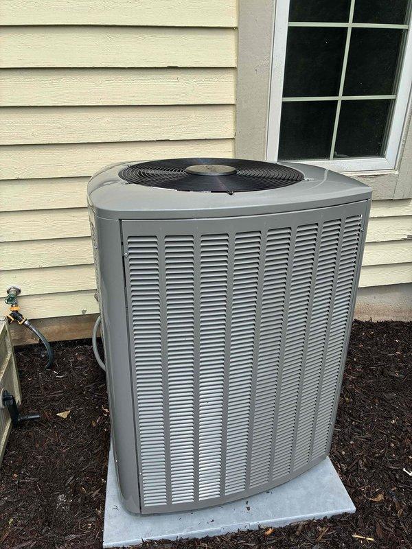 Completed comprehensive air conditioning tune-up and preventive maintenance inspection on residential split system. Performed standard maintenance procedures including inspection of outdoor condenser unit and indoor air handler with dual control modules. All components operating within normal parameters; system found in good working condition with no deficiencies noted.