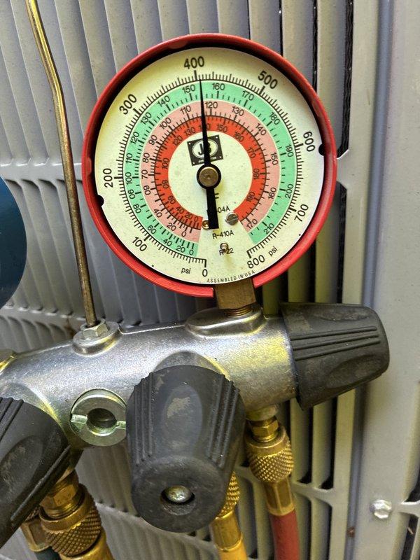 Completed compressor replacement on residential HVAC system under parts and labor warranty. Accessed property through rear entrance as arranged, removed failed compressor unit, and installed replacement compressor. System was evacuated, recharged with refrigerant to manufacturer specifications, and pressure tested to verify proper operation. All refrigerant lines were inspected during installation, and gauge readings confirmed system pressures within normal operating parameters across all zones. Unit was cycled and monitored to ensure proper compressor function and adequate cooling performance before departure.