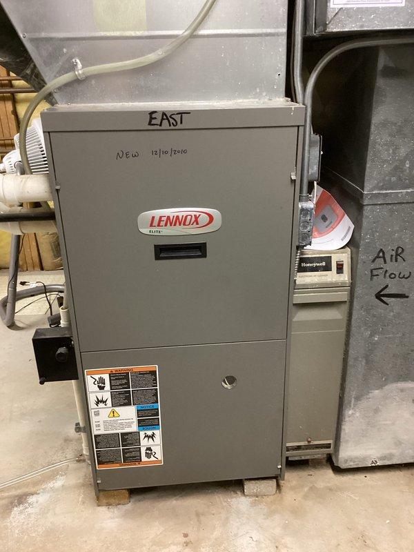 Completed prepaid maintenance visit on residential HVAC system consisting of one boiler and two furnaces. Performed thorough cleaning and operational checks on both furnace units—a Lennox Elite (East zone, installed December 2010) and a Tempstar unit. Inspected all components including heat exchangers, burners, blower assemblies, and condensate drainage systems. Verified proper airflow, tested safety controls, and confirmed all equipment operating within normal parameters. Addressed homeowner inquiry regarding zoning configuration for pool room area; additional specialist visit scheduled to resolve boiler-related zoning concerns. Replaced two 20x25x4 air filters as part of routine maintenance protocol. All accessible ductwork, PVC condensate lines, and control systems inspected and found in satisfactory condition with no immediate repairs required.
