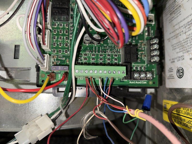 Completed large furnace tune-up and maintenance inspection per agreement terms. Installed customer-provided AA700 control board won at auction, mounting unit within existing HVAC control panel and connecting all necessary wiring to terminal blocks and system components. Verified proper operation of Aprilaire humidifier, air handler unit, refrigerant lines, and all electrical connections throughout the attic-mounted system.