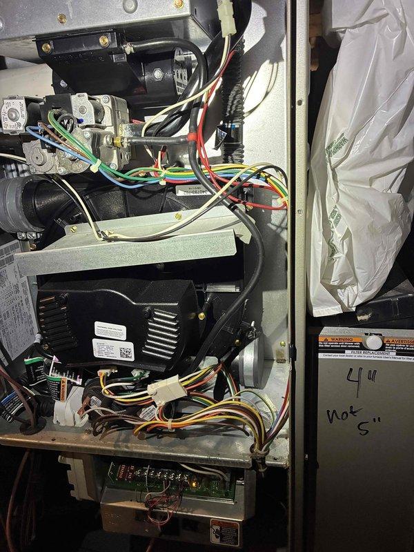Responded to no heat call for upstairs furnace at rental property. Upon arrival, performed diagnostic inspection of aging furnace unit with access panel removed to examine internal components including blower motor, control boards, and electrical connections. Identified and resolved issue preventing furnace operation, restoring heat to upstairs zone. All system components tested and verified operational before departure.