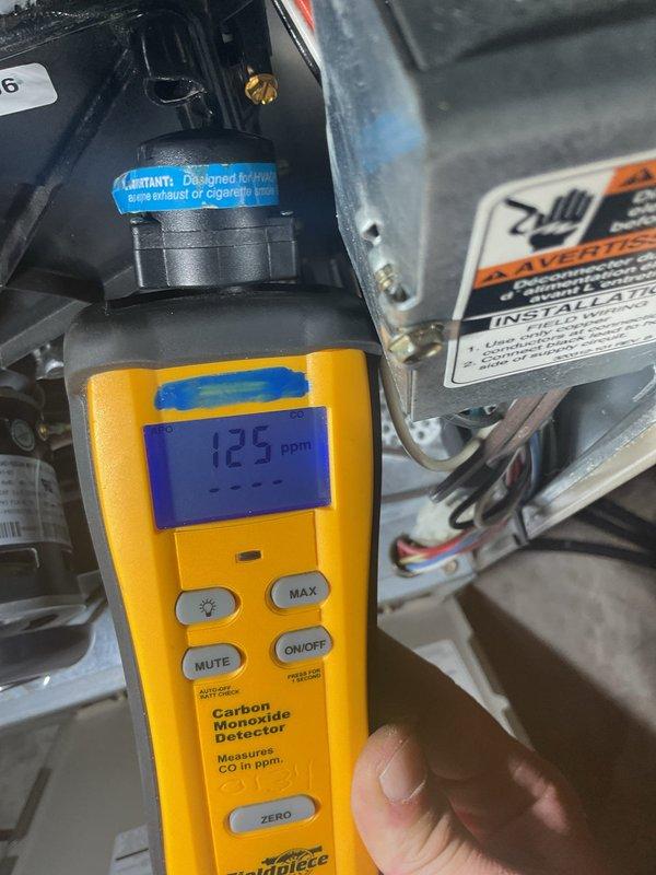 Performed a prepaid tune-up on the Bryant upright gas furnace and inspected the burner/blower compartment, wiring, and motor assembly. Carbon monoxide testing at the furnace recorded sustained levels of 125–177 ppm, indicating unsafe operation. Documented the readings with photos and referred the unit to sales for furnace replacement.