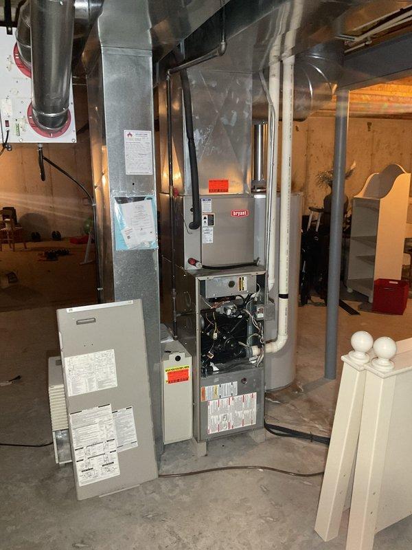 Performed a prepaid tune-up on the Bryant upright gas furnace and inspected the burner/blower compartment, wiring, and motor assembly. Carbon monoxide testing at the furnace recorded sustained levels of 125–177 ppm, indicating unsafe operation. Documented the readings with photos and referred the unit to sales for furnace replacement.