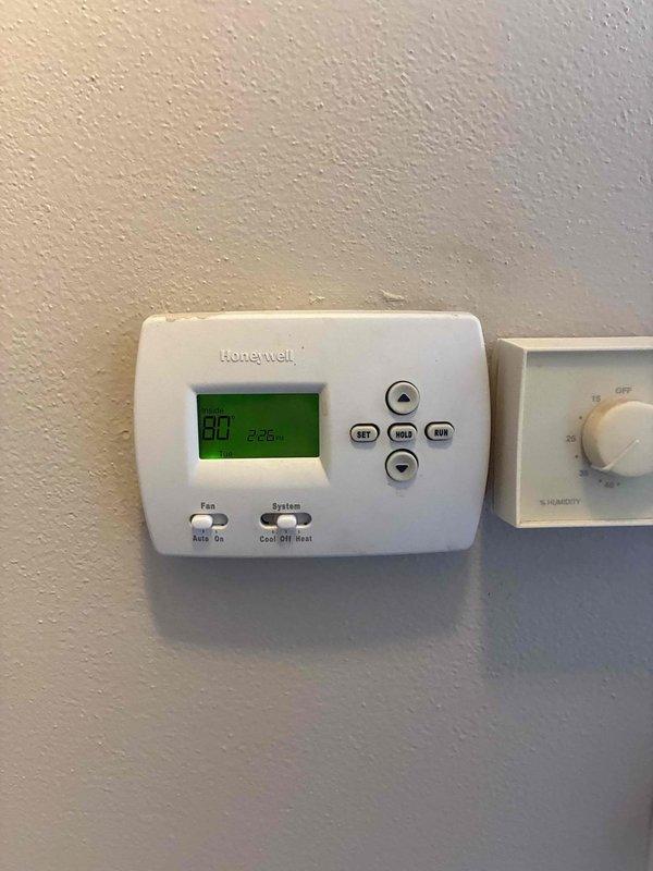 Responded to a no-heat, no-cooling call on a 10+ year old gas furnace. Inspected the furnace with access panels removed, including the inducer motor, pressure switch, gas valve, burner assembly, and control board wiring, and verified the Honeywell thermostat settings and operation (indoor temperature 80°). Diagnostics were performed on the heating and cooling control circuits to restore system operation.