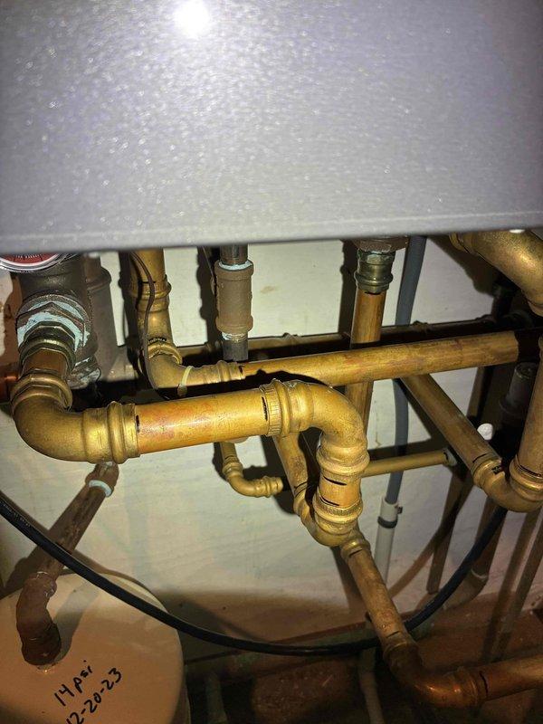 Replaced the internal valve on the boiler and verified proper operation of the associated piping and fittings. Inspected the system, noting an oxidized threaded connection on an upper fitting and a recorded expansion tank pre-charge of 14 psi. Repair was performed under parts warranty only, and a recommendation was documented for future boiler evaluation or replacement should additional issues arise.