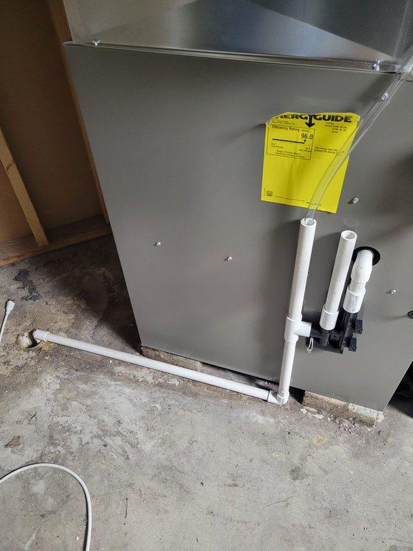 Removed the existing furnace and installed a new 96% AFUE Lennox gas furnace, reusing the existing return drop, media filter cabinet, and line set. Replaced the 1.5" PVC with 2" PVC for the venting and combustion air runs, then connected the condensate drain and gas piping. Verified electrical connections to the panel and confirmed the unit was left in clean, operational condition.
