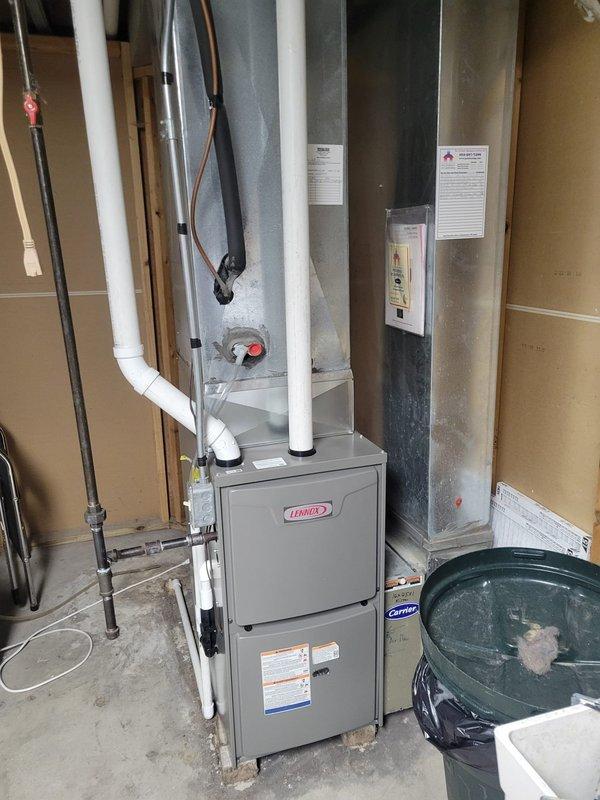 Removed the existing furnace and installed a new 96% AFUE Lennox gas furnace, reusing the existing return drop, media filter cabinet, and line set. Replaced the 1.5" PVC with 2" PVC for the venting and combustion air runs, then connected the condensate drain and gas piping. Verified electrical connections to the panel and confirmed the unit was left in clean, operational condition.