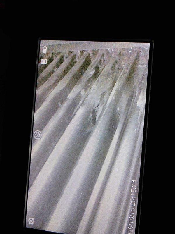 Performed annual preventative maintenance on two furnaces, including inspection of the evaporator coil with a borescope camera, which revealed scale and residue buildup, and verification of the gas supply shutoff valve at unit #1. Serviced the system's air filtration components and UV lamp assemblies per the maintenance plan.
