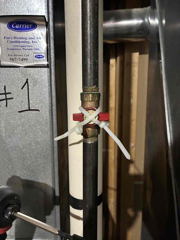 Performed annual preventative maintenance on two furnaces, including inspection of the evaporator coil with a borescope camera, which revealed scale and residue buildup, and verification of the gas supply shutoff valve at unit #1. Serviced the system's air filtration components and UV lamp assemblies per the maintenance plan.