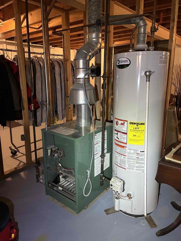Performed the annual fall tune-up on the gas-fired boiler, inspecting the burner assembly, flue and draft hood venting, circulator pump, expansion tank, pressure gauge, and associated piping and valves. The system was found to be operating normally with no leaks, corrosion, or deficiencies noted, and the customer was enrolled in the maintenance club program.