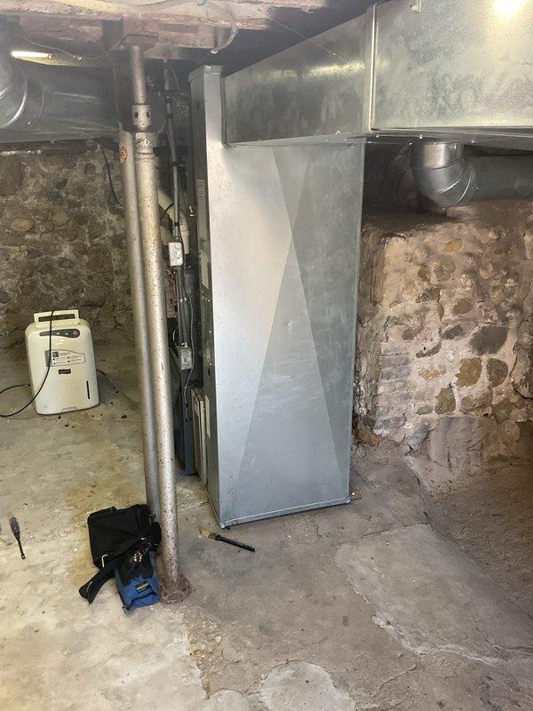 Performed a prepaid annual tune-up on a Goodman gas furnace, inspecting the burners, gas valve, inducer and blower assemblies, wiring, and condensate drainage components. During inspection, a cracked front fascia of the heat exchanger was identified. The finding has been forwarded to sales for a free replacement quote.