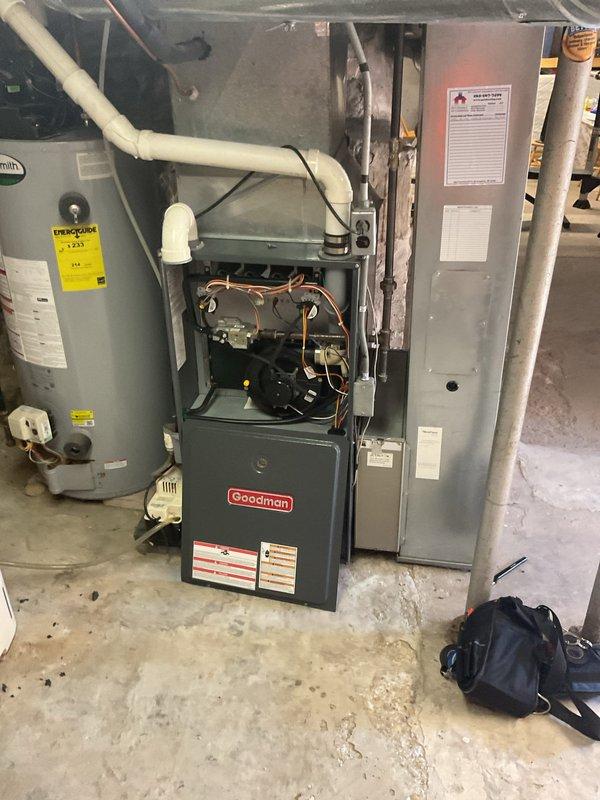 Performed a prepaid annual tune-up on a Goodman gas furnace, inspecting the burners, gas valve, inducer and blower assemblies, wiring, and condensate drainage components. During inspection, a cracked front fascia of the heat exchanger was identified. The finding has been forwarded to sales for a free replacement quote.