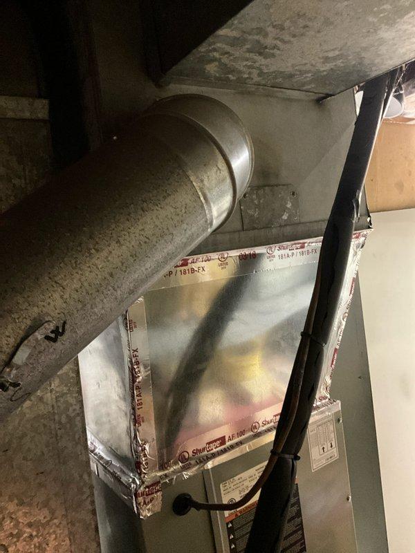 Performed diagnostic assessment on customer's humidifier system in response to reported malfunction and high water consumption. Inspected the beige humidifier unit mounted on the HVAC ductwork in the basement, examining connections and water supply lines. Determined the humidifier was leaking due to a faulty solenoid valve, which was replaced to restore proper operation and eliminate excess water usage.