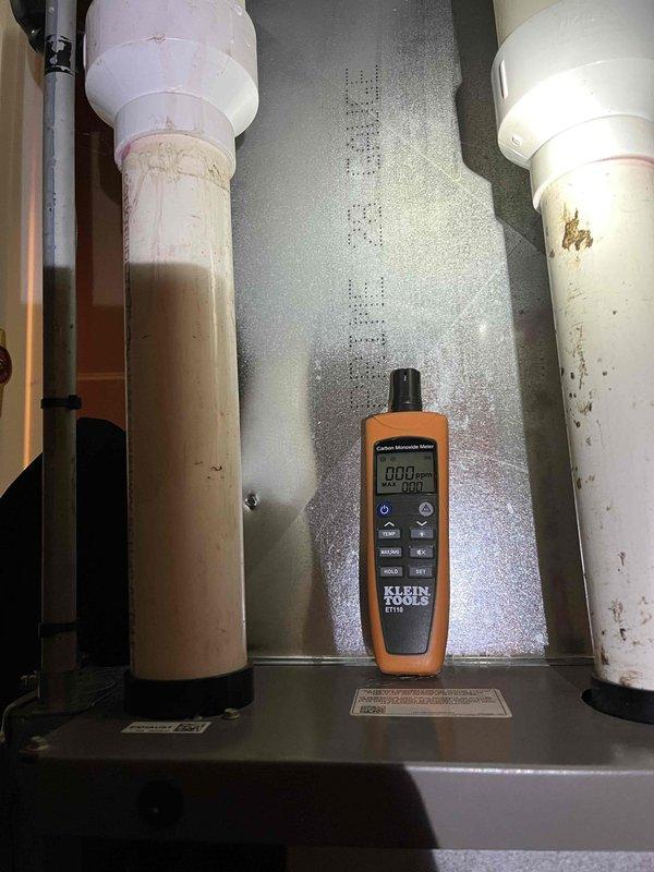 Performed annual BFMA tune-up on 12-year-old furnace system. Conducted carbon monoxide safety testing using Klein Tools ET120 detector with readings at 000 PPM, confirming proper combustion and ventilation. Inspected condensate drainage system, noting minor discoloration in PVC pipes that remains within acceptable operating parameters.