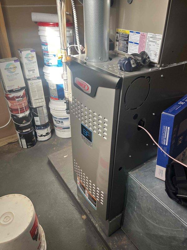 Performed regular BFMA tune-up service on a 4-year-old Lennox furnace system with dual humidifiers. Discovered and replaced severely clogged air filter that was restricting proper airflow and reducing system efficiency. Completed comprehensive maintenance on both furnace units and replaced both humidifier pads as part of the scheduled maintenance protocol.