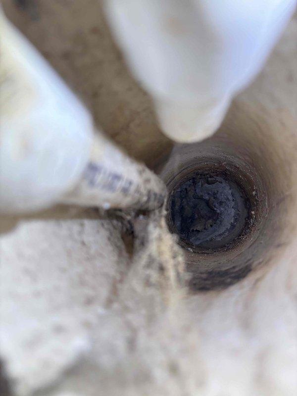 Responded to emergency service call for unusual odor emanating from HVAC vents. Upon inspection, discovered significant dust, cobweb accumulation, and residue buildup in the ventilation system and drain pipe. Performed thorough cleaning of affected components to eliminate the source of the odor.