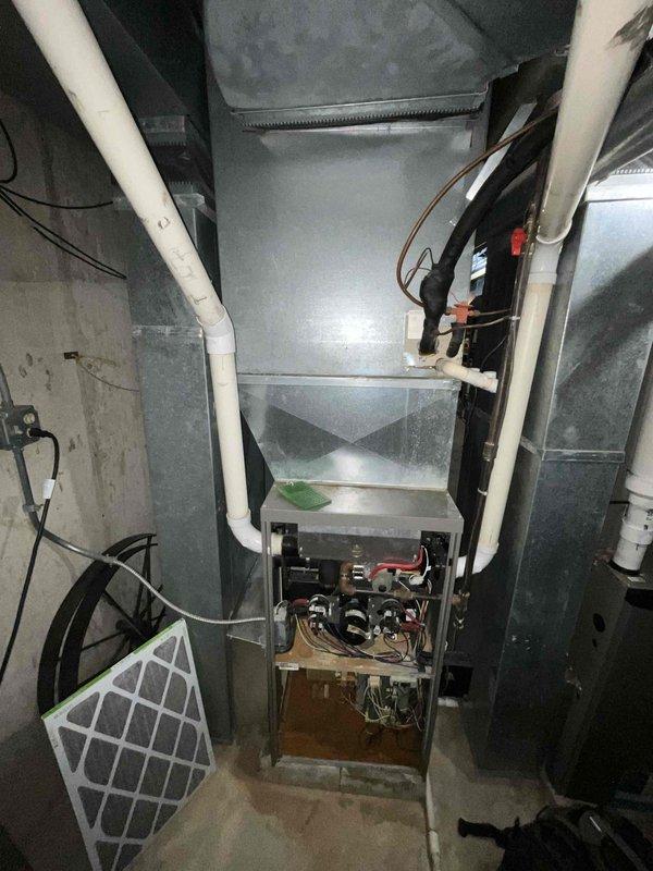 Successfully installed a complete Lennox HVAC system featuring an EL297UH090XV48CK variable-speed furnace and EL15KC1-042 AC unit with CK40CT-48C coil. System installation included proper venting with PVC pipes, electrical connections to the breaker panel, and additional components including a humidifier, P200 thermostat, and AA1210 air purifier for improved indoor air quality.