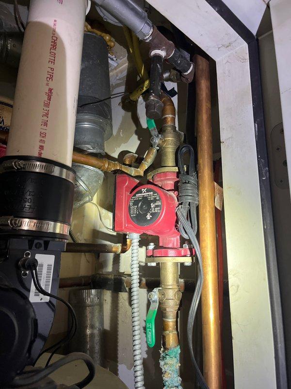Diagnosed and repaired no-heat issue on residential boiler system by replacing failed Grundfos circulation pump that was preventing proper water circulation through heating loops. System is now operating normally with proper heat distribution and error codes cleared.